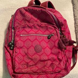 Rare Kipling laptop backpack- pink psychedelic design with pink/purple gorilla.